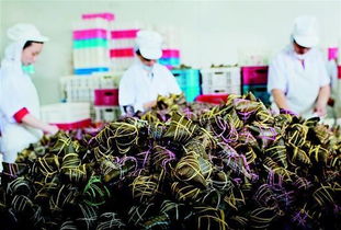 指尖上的匠心传承 90后包粽工的一天